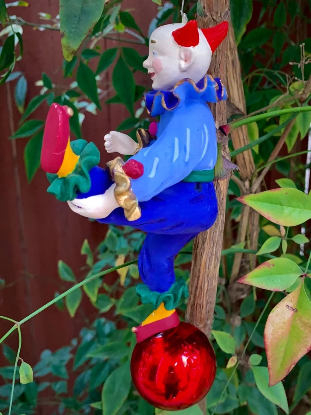 Hand-painted folk art ornament • Lightweight, carved-style construction